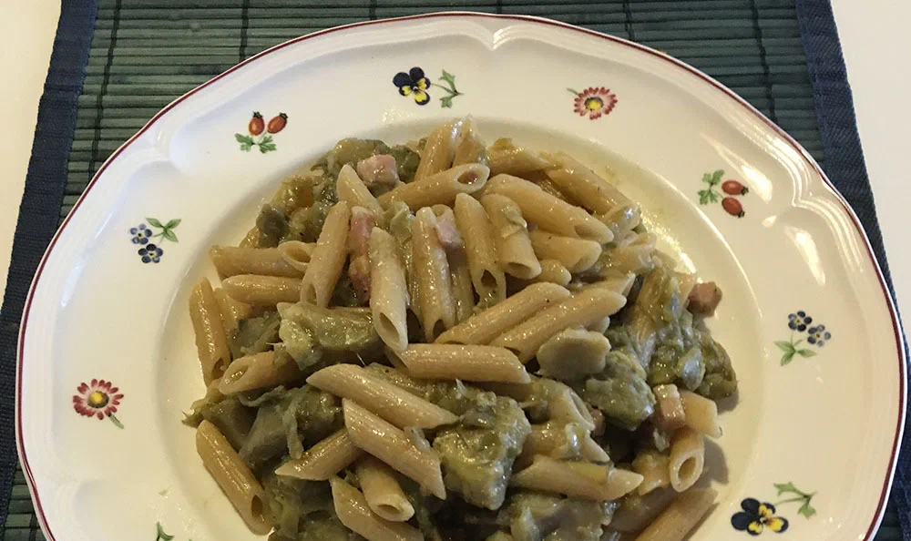 Penne di farro carciofi e pancetta affumicata