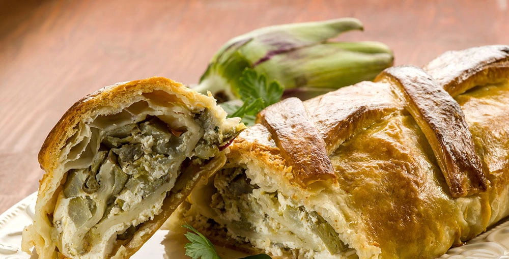 strudel with artichoke and ricotta, vegetarian food
